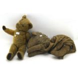 A 20th century teddy bear and pyjama case,