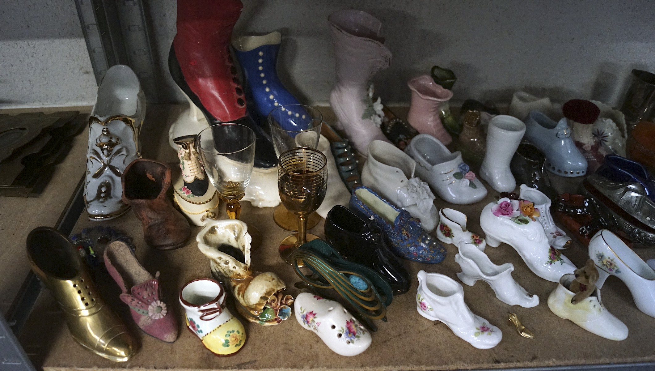 A large collection of ceramic and pottery shoe and boot ornaments, - Image 4 of 5