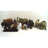 A collection of assorted figures of elephants,