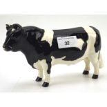 A Beswick Friesian bull, marked 'CH Coddington Hill Bar'