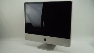 A 24 inch Apple Mac desktop computer,