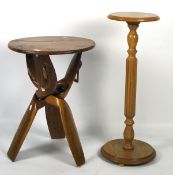 A naturalistic wooden occasional table and a contemporary jardiniere stand,