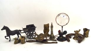 A collection of metal and brassware,