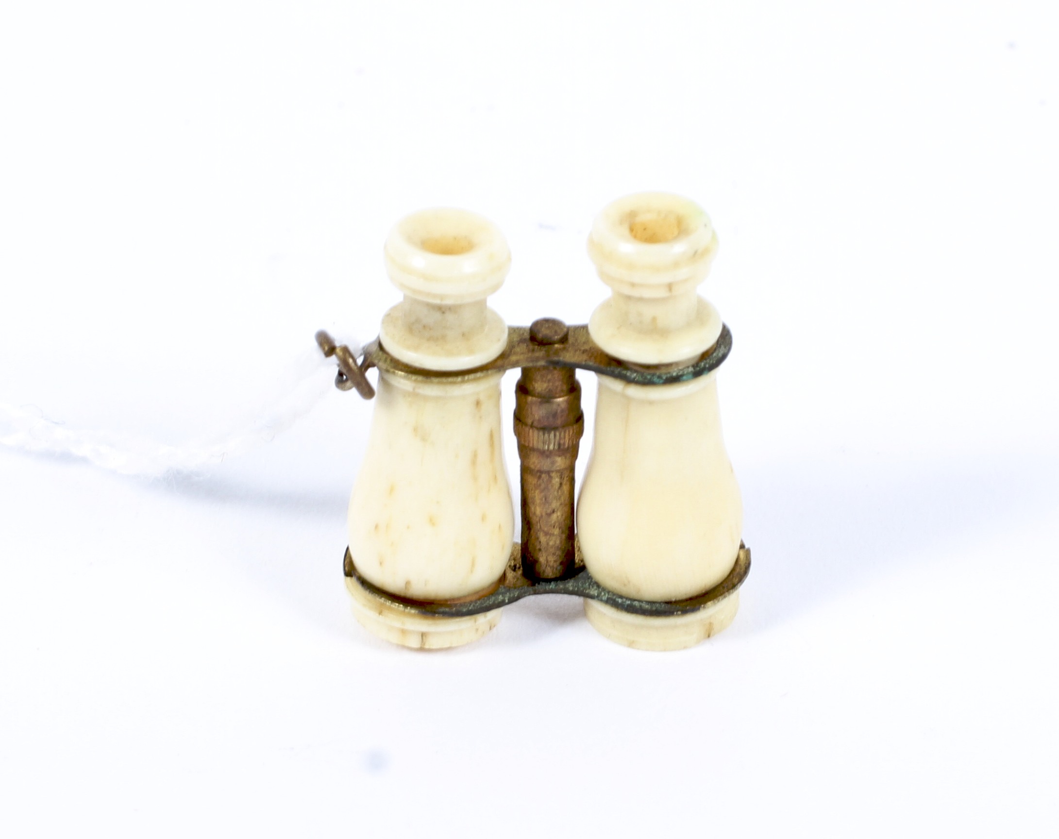 A late 19th century set of miniature novelty bone binoculars , - Image 2 of 2