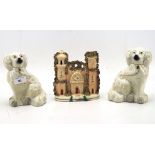 A pair of 19th century Staffordshire spaniels and a pastille burner,