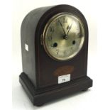 A 20th century stained wood dome topped mantle clock,