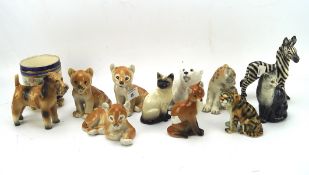 A collection of ceramic figures of animals, the majority being USSR