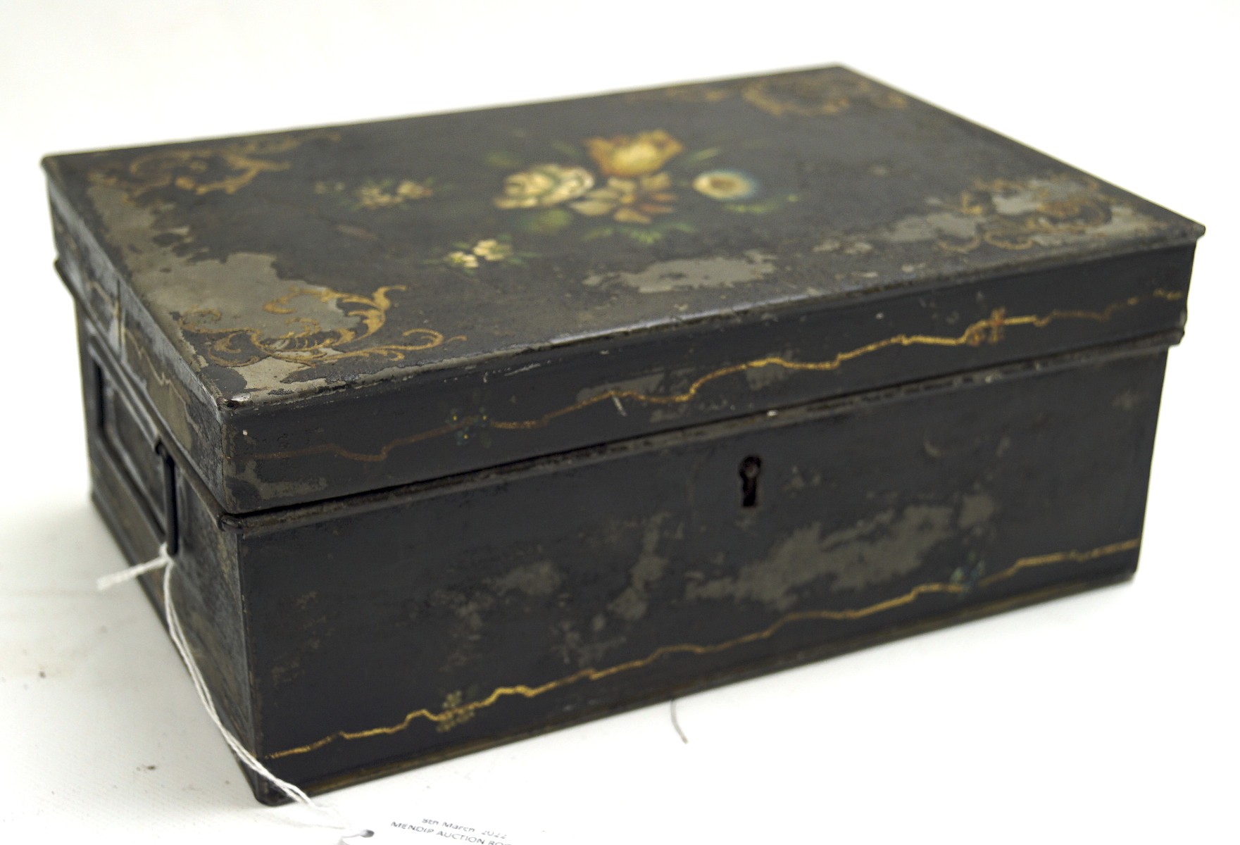 An unusual painted metal money storage box,