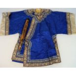 An early 20th century Chinese robe and parasol,