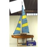 A large remote controlled pond yacht,