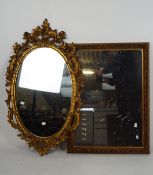 Two gilt framed wall mirrors, one with pierced and scrolling border,