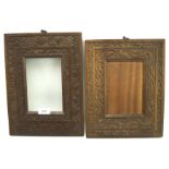 Two carved wooden picture frames,