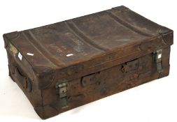 An early 20th century leather suitcase lined in pale blue,