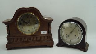 Two vintage mantle clocks, one with silvered face featuring Arabic numerals, marked Smiths Enfield,