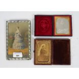 Two 19th century leather bound daguerreotype photos, one depicting Queen Victoria, the other a lady,