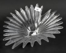 A large art glass fruitbowl, in the form of a stylised shell,