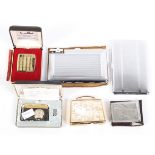 A selection of lighters and cigarette cases,