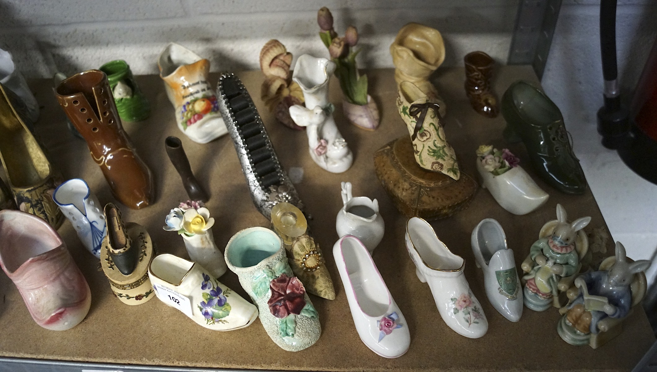 A large collection of ceramic and pottery shoe and boot ornaments, - Image 2 of 5