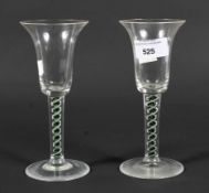 A pair of 20th century sprial stem wine glasses, with trumpet shaped bowls, 17.