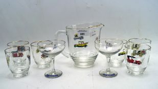 A vintage lemonade set and Babycham, including six beakers and a jug all decorated with cars,