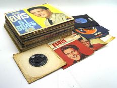 A collection of vintage Elvis Presley vinyl LP records and singles,