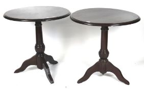 Two modern stained wooden tables,