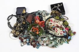 A collection of costume jewellery, including beaded necklaces, bandles,