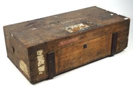 A late 19th century wooden trunk marked Pemberton Chartered Bank,