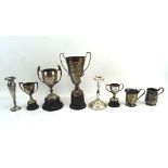 A variety of silver plated ware, including animal related trophies,