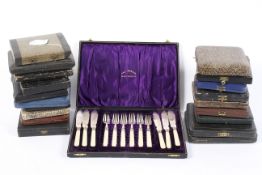 A set of six Edwardian silver-mounted fish knives and forks,