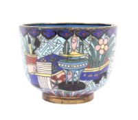 A Chinese Qing Dynasty cloisonne cup decorated with scholar's objects and vases of flowers on a