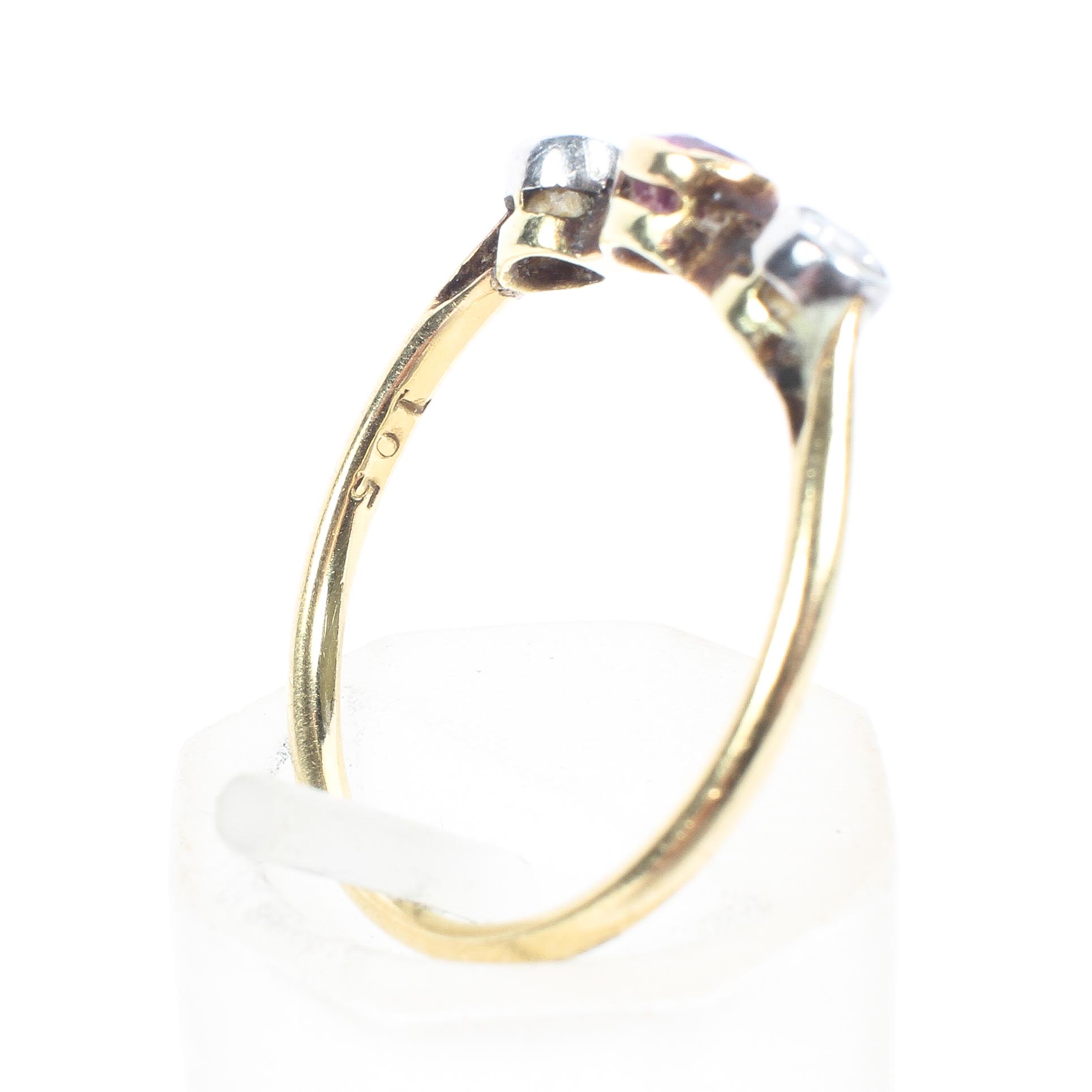 An 18ct gold and diamond three stone ring together with a 9ct ruby ring with diamond accents, - Image 4 of 5