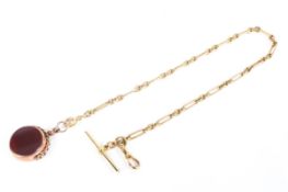 An 18ct yellow gold albert chain, with fantasy link T bar and lobster clasp, width 35cm, 29.