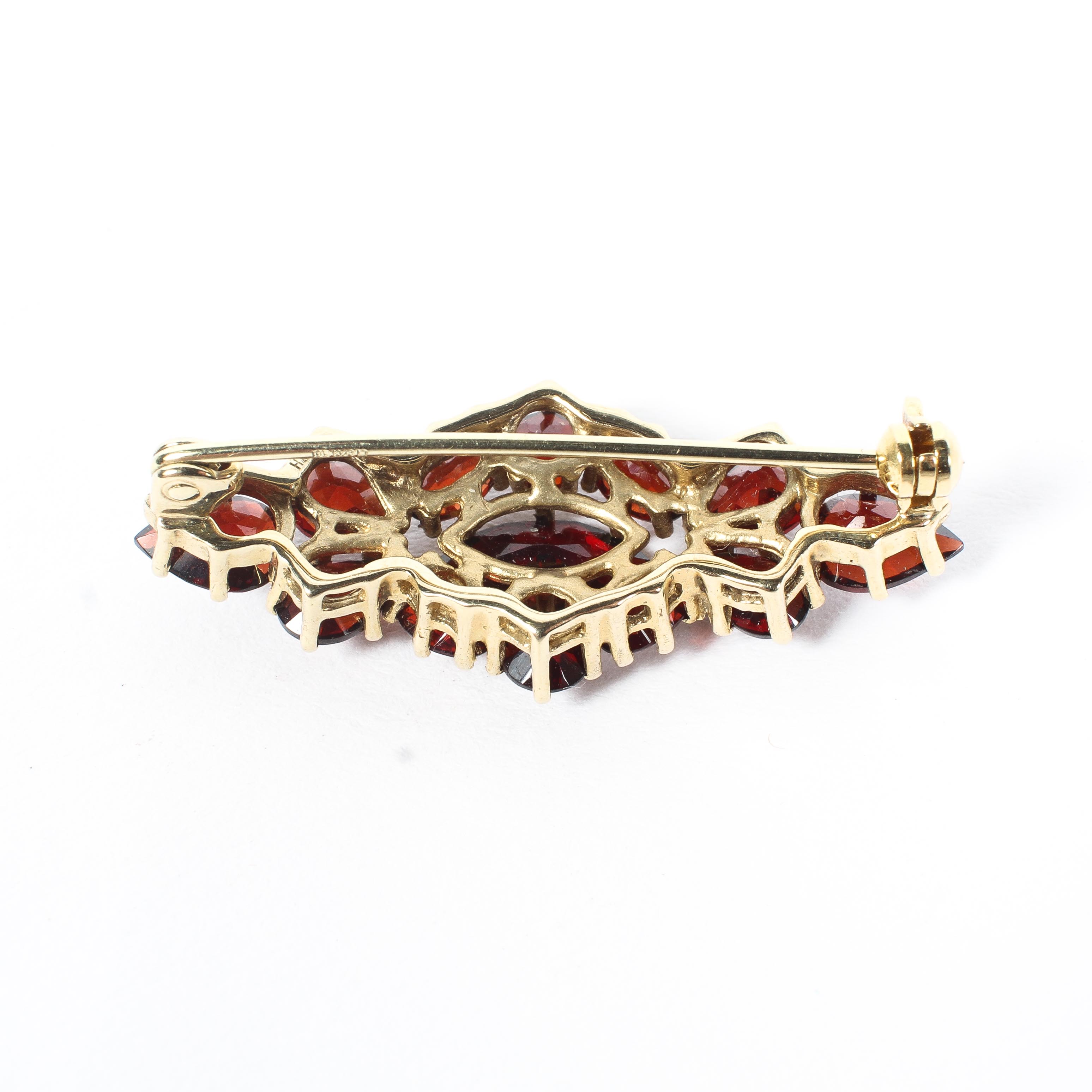 A 9ct gold red garnet set ring and matching bar brooch, - Image 4 of 5