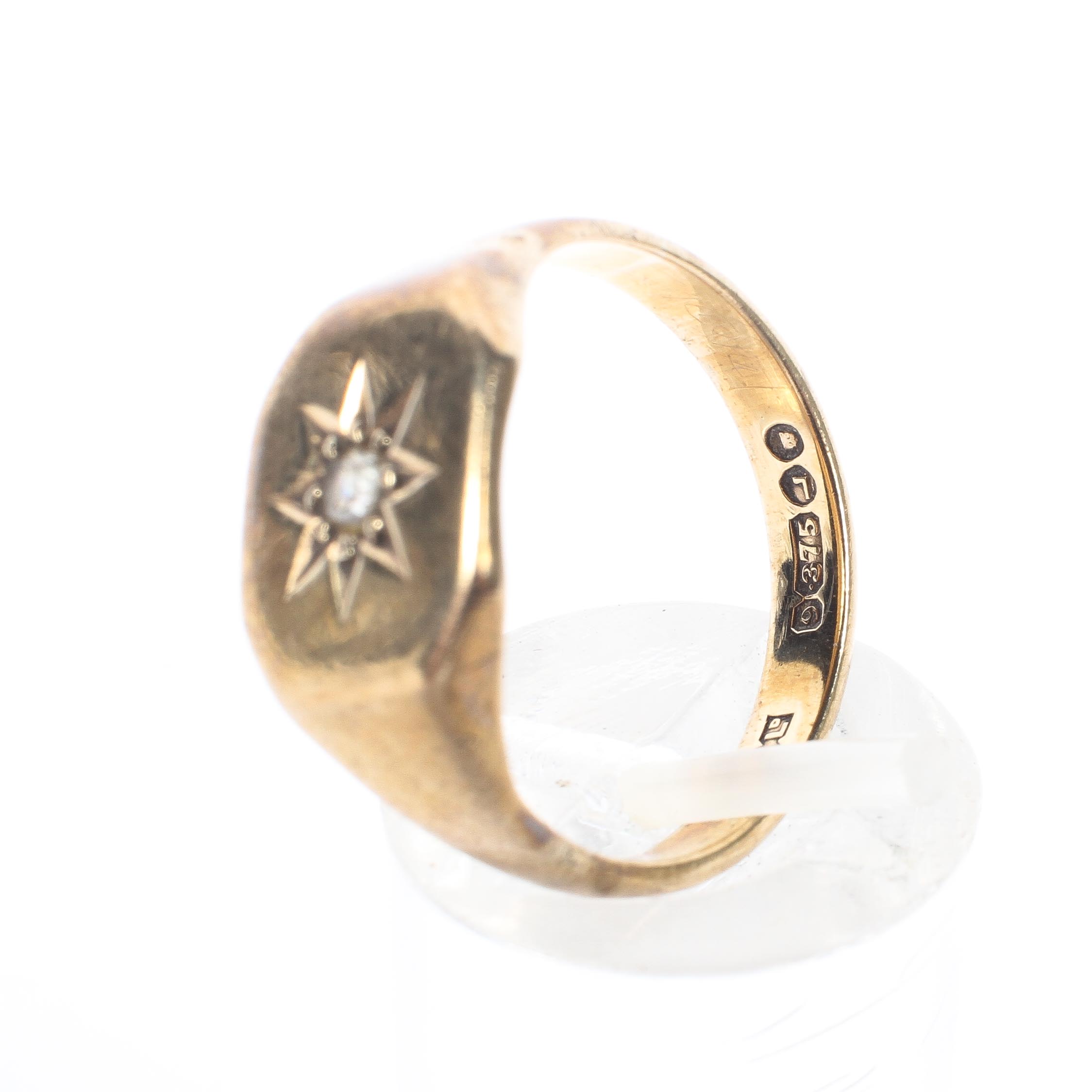 A 9ct yellow gold signet ring, set with a single white stone in a starburst mount to the centre, 3. - Image 4 of 4