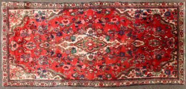 An eastern wool work Quality Hamedan floral red and blue.