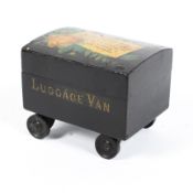 A Victorian painted wooden miniature luggage van box and cover,