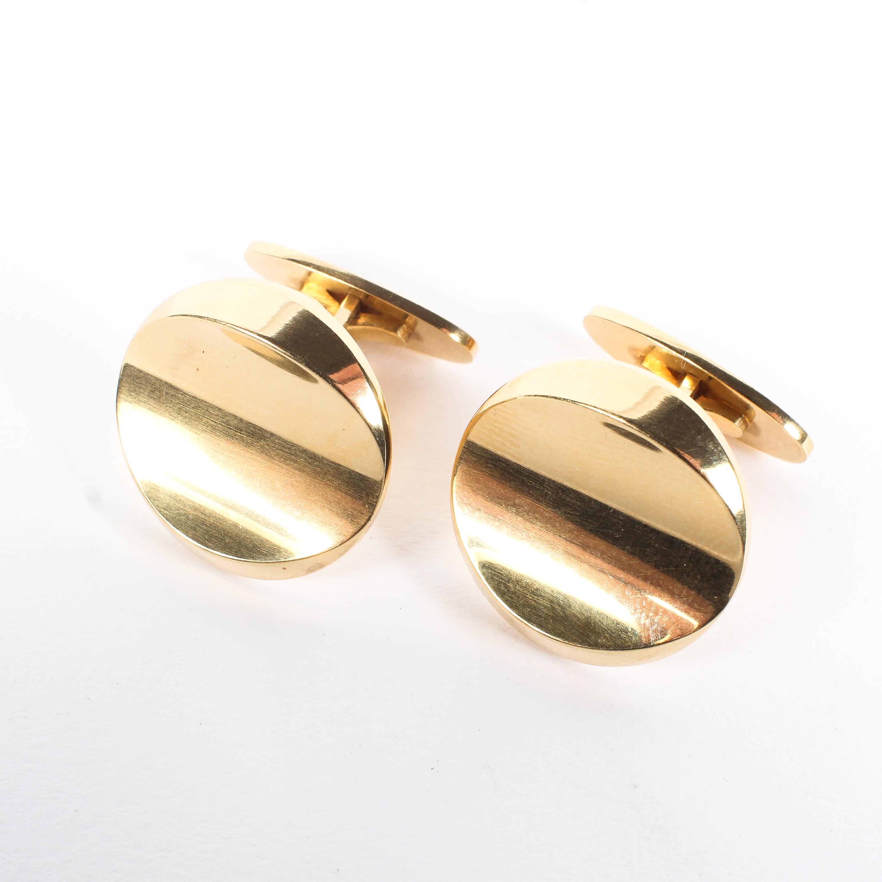 A pair of vintage 18ct gold George Jensen cufflinks, of circular polished roundell form,