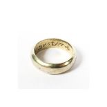 A mid-16th century/early 17th century yellow metal posy ring, with thick D-shape cross section hoop,