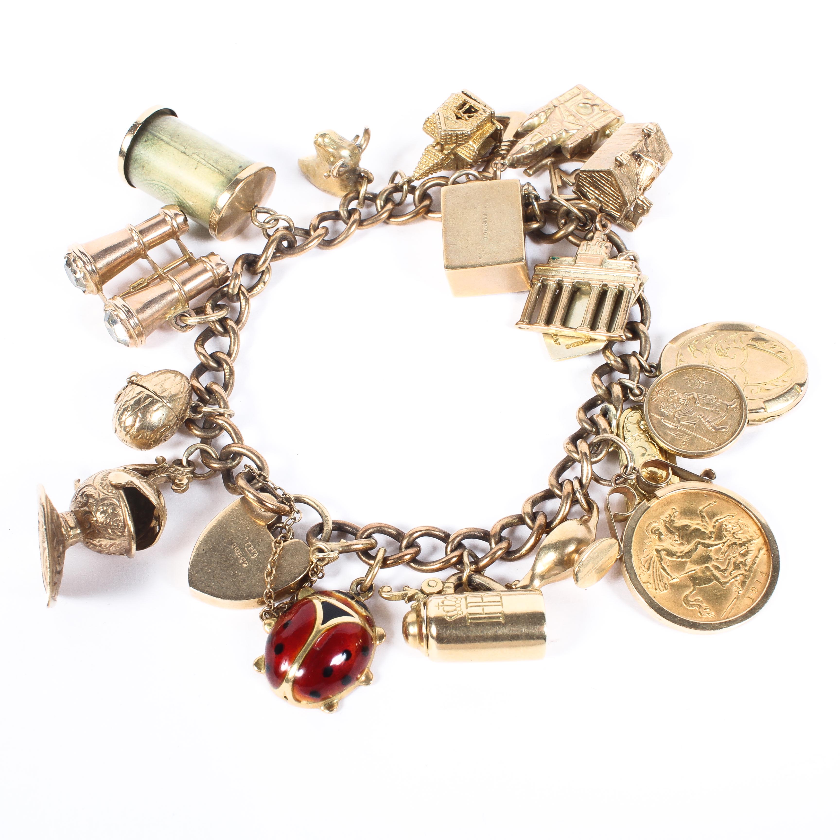 A 9ct yellow gold curb link charm bracelet,