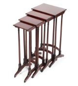 A quartetto nest of mahogany tables on reeded legs and saber supports Condition Report: