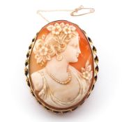 A 9ct gold mounted cameo brooch, with finely detailed bust portrait of a classical lady,