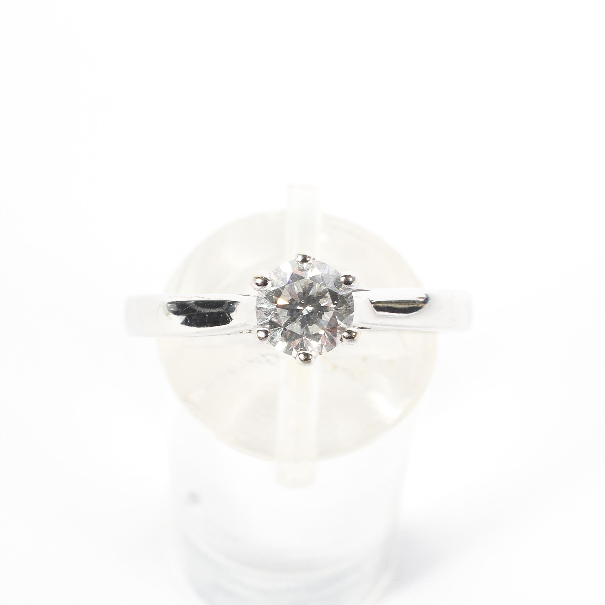 An unmarked white metal and single stone diamond ring, Central 0. - Image 2 of 7