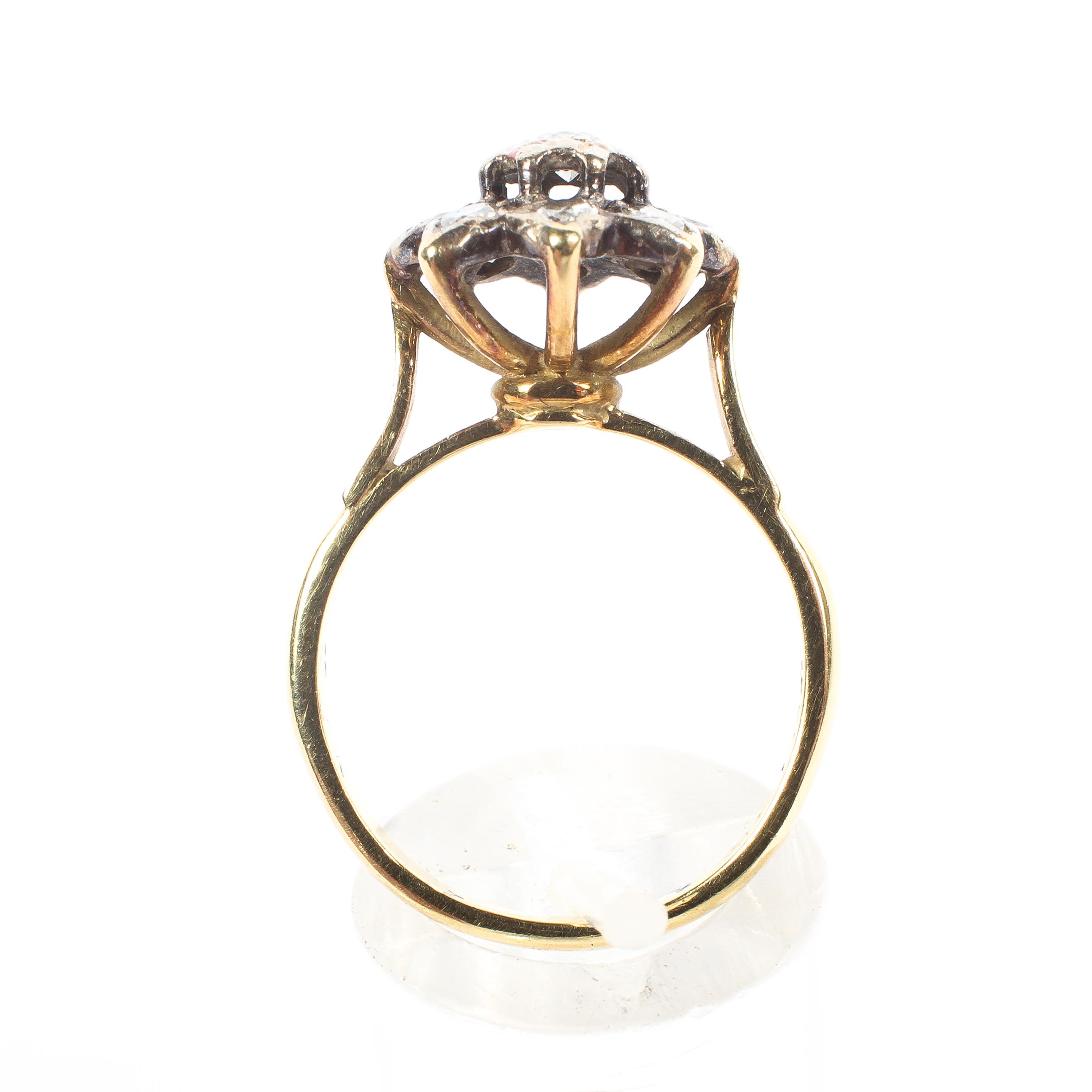 An 18ct gold and diamond cluster ring, set with nine brilliant cut diamonds, central stone approx 0. - Image 3 of 4