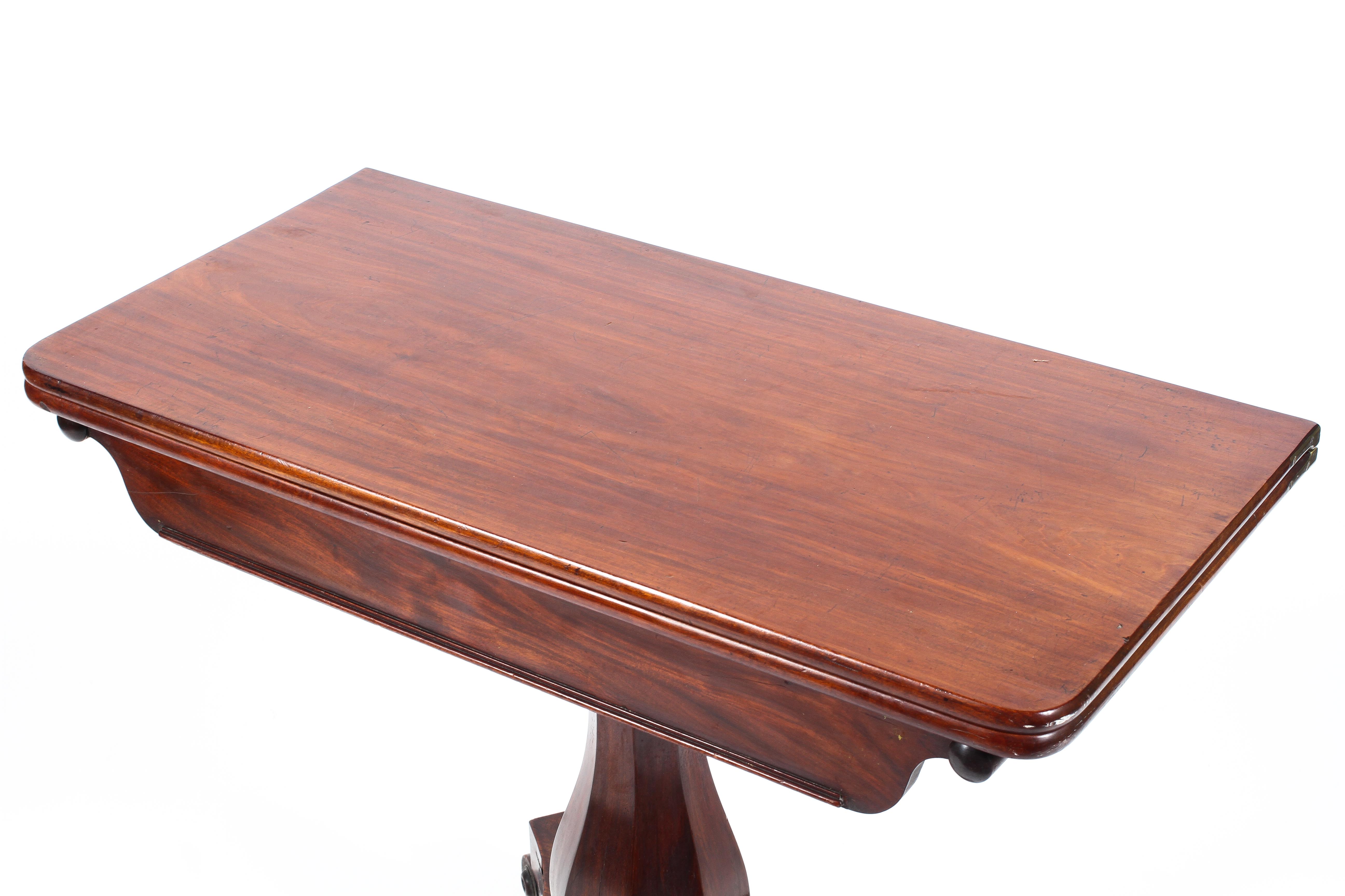 A Victorian mahogany fold over swivel topped tea table, - Image 2 of 3