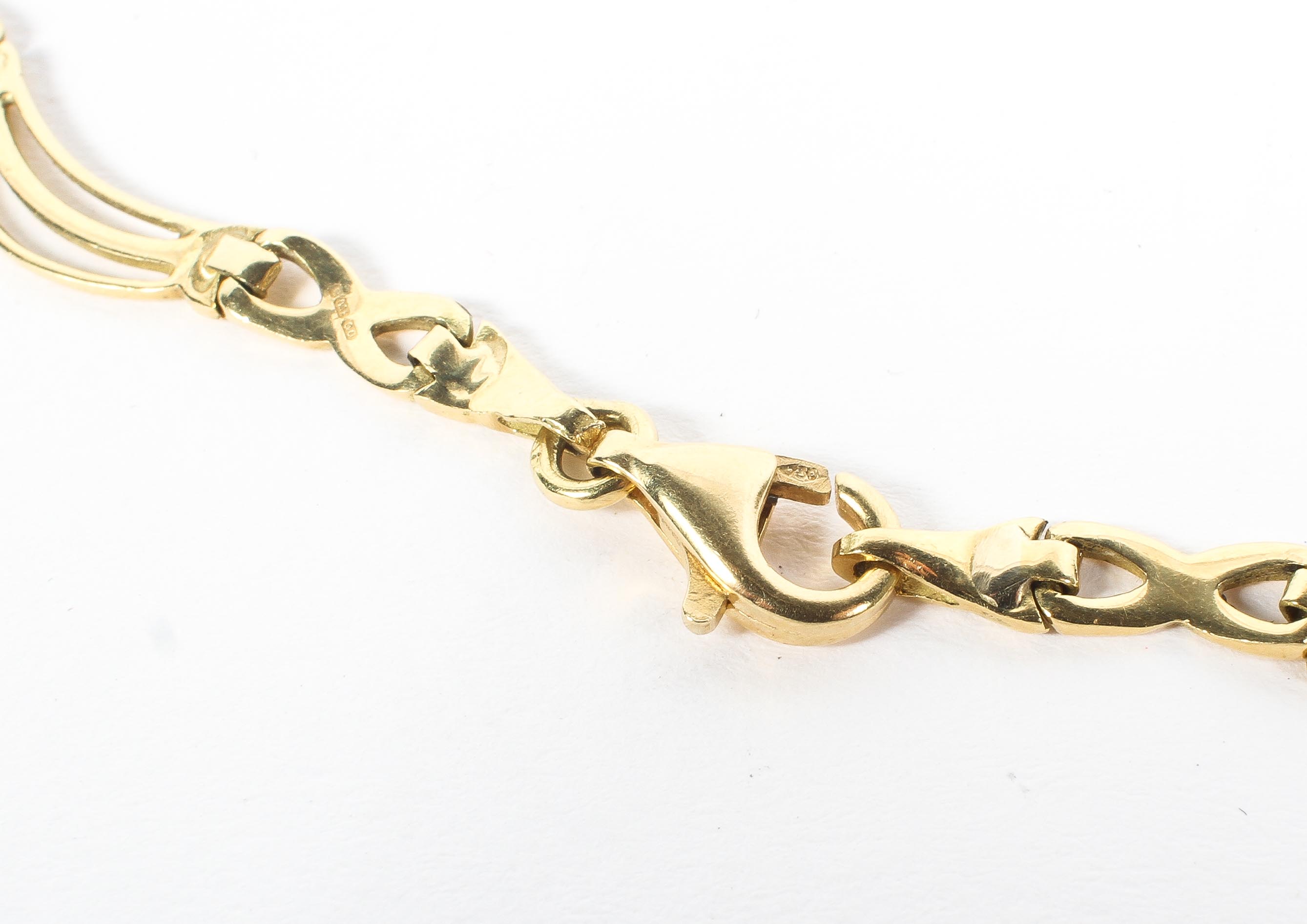 An 18ct gold flat fancy link necklace together with matching bracelet..43cm and 18cm. 25g. - Image 3 of 3