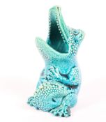 A Burmantofts Faience turquoise glazed spoon warmer in the form of a crocodile, late 19th century,