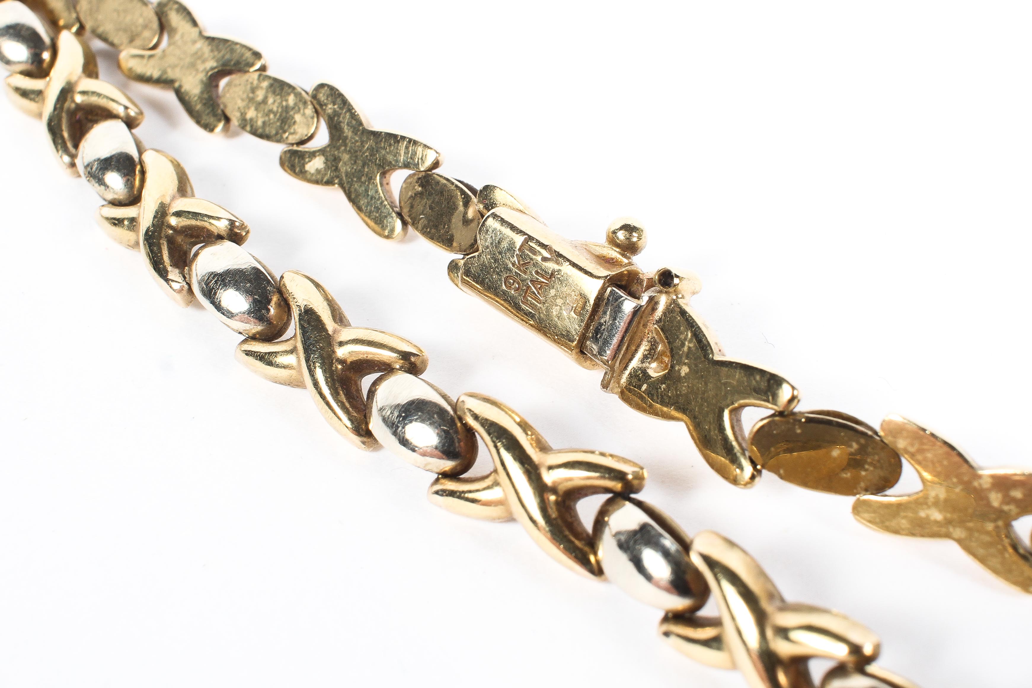 An Italian 9ct white and yellow gold flat fancy link necklace. 43cm. 18g. - Image 2 of 2