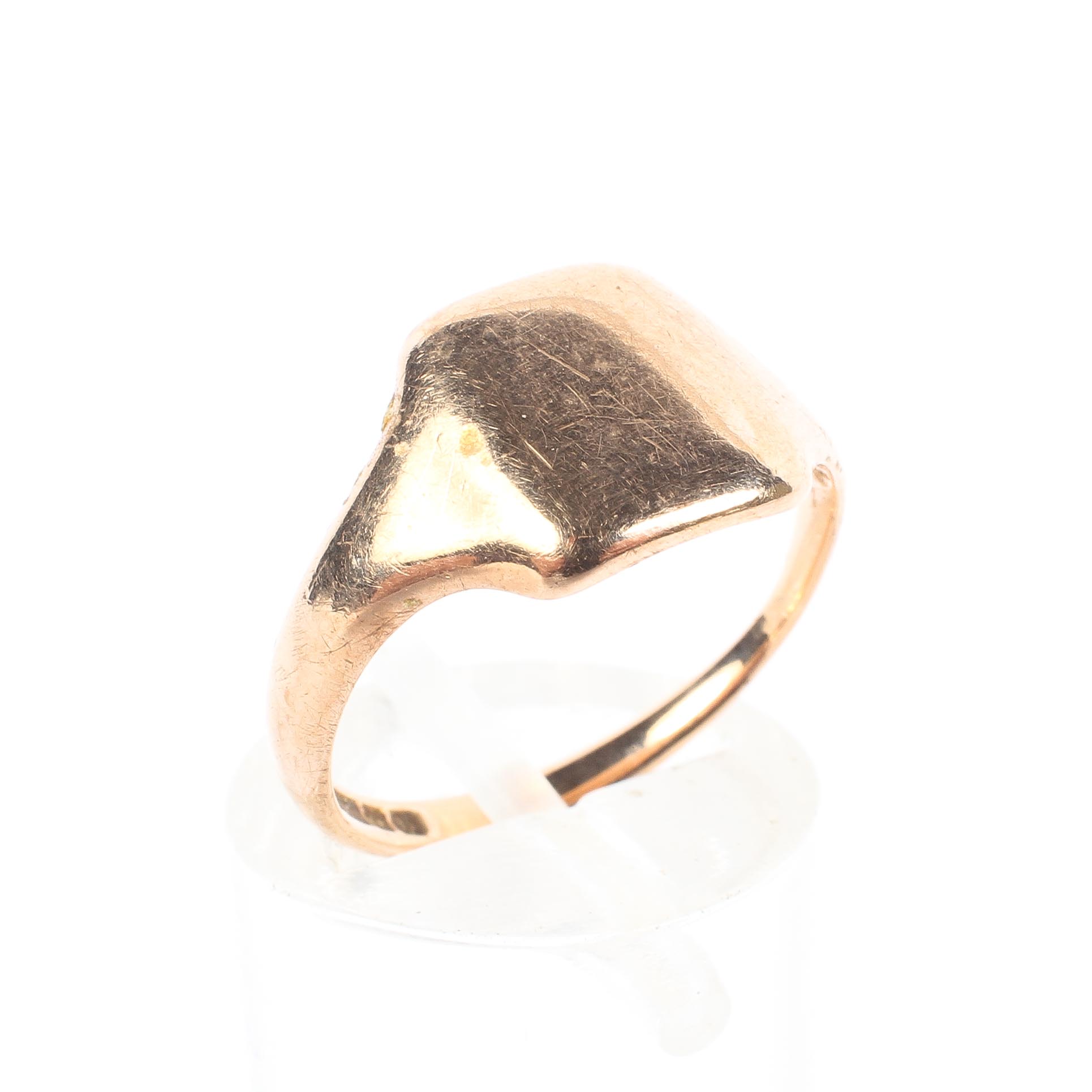 A 9ct rose gold signet ring, inscription to reverso, size L, 2.