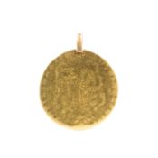 A Georgian gold guinea fashioned into a pendant, 7.